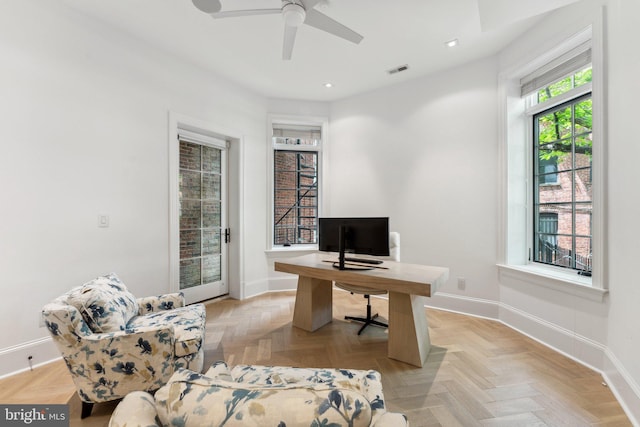 office space featuring baseboards, a ceiling fan, and recessed lighting