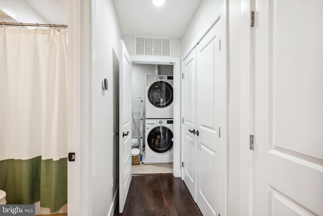 528 Kennedy St NW Unit 502, Washington, DC 20011 - washroom with stacked washer / drying machine and dark wood finished floors