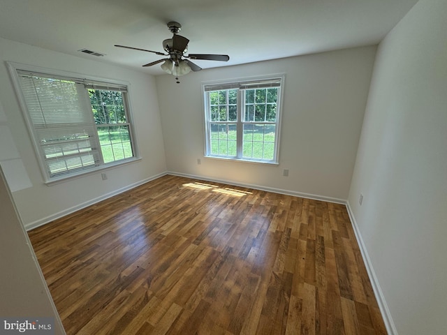 8888 Harmony Rd, Denton, MD 21629 - spare room with healthy amount of natural light, wood finished floors, baseboards, and ceiling fan