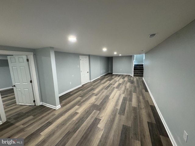 581 Milford Neck Rd, Milford, DE 19963 - finished basement with stairway, dark wood-style floors, baseboards, and recessed lighting