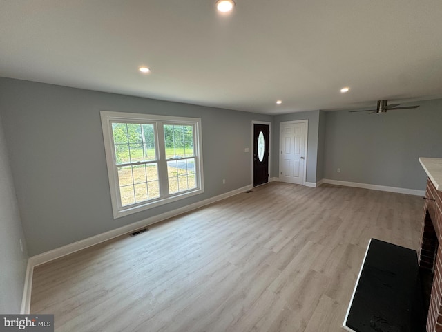 581 Milford Neck Rd, Milford, DE 19963 - unfurnished living room featuring recessed lighting, light wood finished floors, baseboards, and a ceiling fan