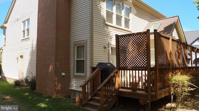 7501 Silver Maple Ln, Falls Church, VA 22042 - back of house featuring a wooden deck and brick siding