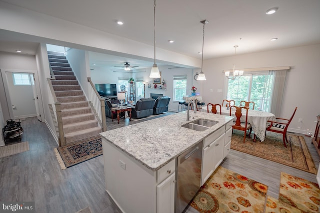 8212 Hickory Hollow Dr, Glen Burnie, MD 21060 - kitchen featuring a sink, dishwasher, light wood-style floors, white cabinetry, and recessed lighting