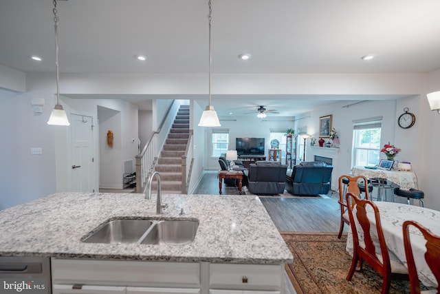 8212 Hickory Hollow Dr, Glen Burnie, MD 21060 - kitchen featuring a sink, dark wood-style floors, ceiling fan, white cabinetry, and recessed lighting