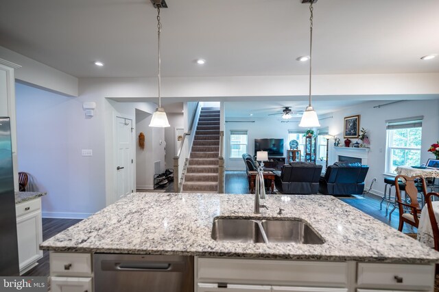 8212 Hickory Hollow Dr, Glen Burnie, MD 21060 - kitchen featuring a sink, open floor plan, white cabinets, dark wood-style floors, and recessed lighting