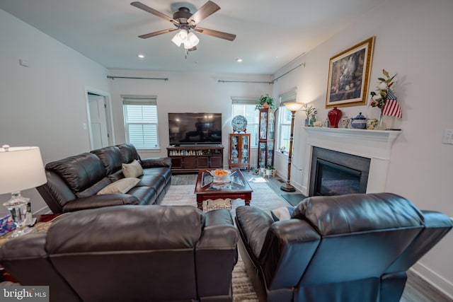 8212 Hickory Hollow Dr, Glen Burnie, MD 21060 - living room with healthy amount of natural light, a ceiling fan, wood finished floors, baseboards, and recessed lighting