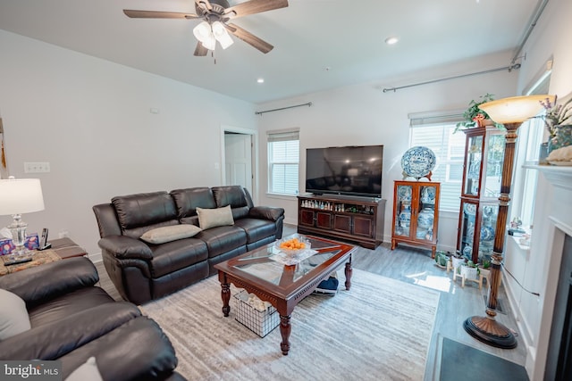 8212 Hickory Hollow Dr, Glen Burnie, MD 21060 - living room with wood finished floors, ceiling fan, plenty of natural light, recessed lighting, and baseboards