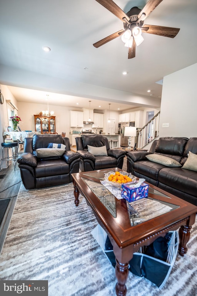 8212 Hickory Hollow Dr, Glen Burnie, MD 21060 - living room featuring a ceiling fan, a chandelier, and recessed lighting