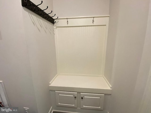 8212 Hickory Hollow Dr, Glen Burnie, MD 21060 - mudroom with baseboards