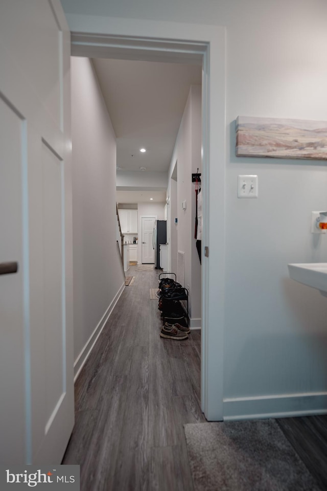 8212 Hickory Hollow Dr, Glen Burnie, MD 21060 - hall featuring wood finished floors, baseboards, and recessed lighting