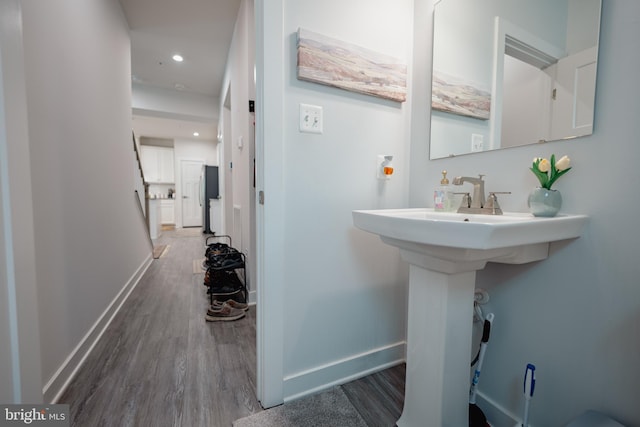 8212 Hickory Hollow Dr, Glen Burnie, MD 21060 - bathroom with wood finished floors, baseboards, and recessed lighting