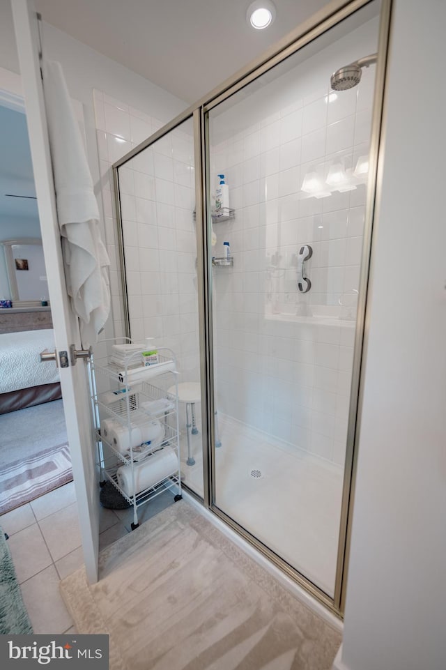 8212 Hickory Hollow Dr, Glen Burnie, MD 21060 - ensuite bathroom featuring a shower stall and tile patterned flooring