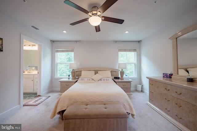 8212 Hickory Hollow Dr, Glen Burnie, MD 21060 - bedroom featuring light carpet, multiple windows, baseboards, and recessed lighting