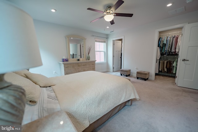 8212 Hickory Hollow Dr, Glen Burnie, MD 21060 - bedroom with a spacious closet, light colored carpet, a closet, recessed lighting, and a ceiling fan