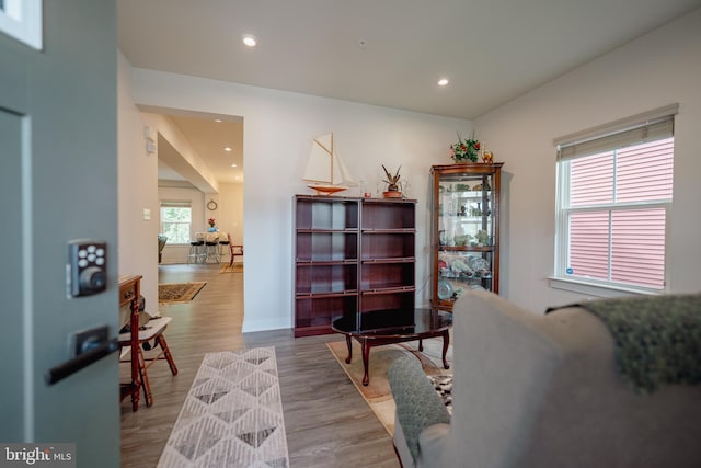 8212 Hickory Hollow Dr, Glen Burnie, MD 21060 - living area featuring wood finished floors, recessed lighting, and baseboards