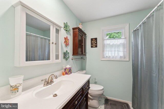 4329 Stream Bed Way, Alexandria, VA 22306 - bathroom with toilet, vanity, and baseboards