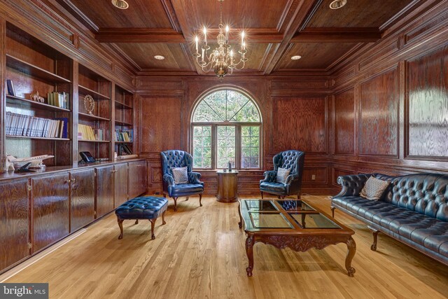 living area featuring wooden ceiling, wooden walls, a chandelier, wood finished floors, and beamed ceiling
