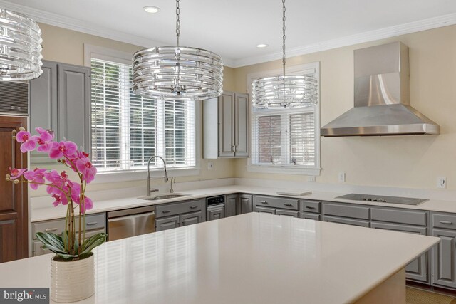 kitchen with gray cabinets, wall chimney exhaust hood, a sink, black electric stovetop, and dishwasher