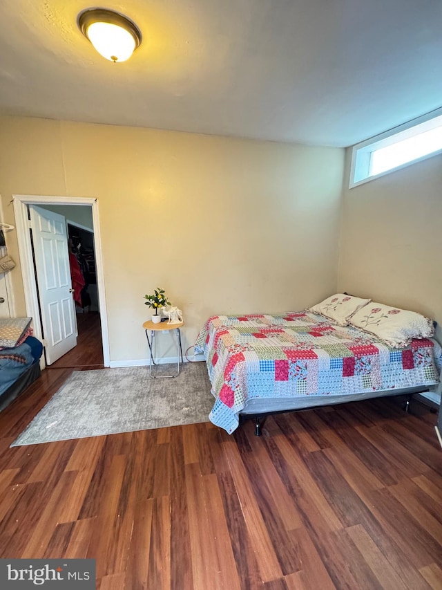 707 Mentor Ave, Capitol Heights, MD 20743 - bedroom featuring wood finished floors and baseboards