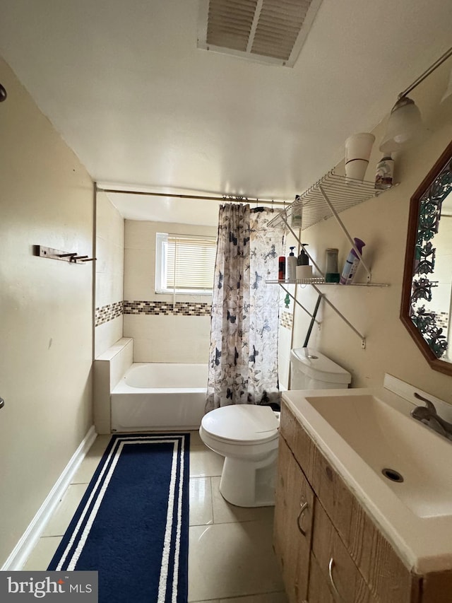 707 Mentor Ave, Capitol Heights, MD 20743 - bathroom with toilet, vanity, shower / tub combo, and tile patterned flooring