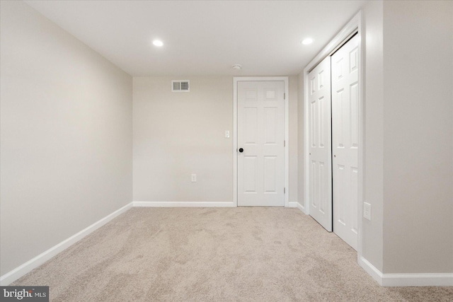 1413 E Lafayette Ave, Baltimore, MD 21213 - unfurnished bedroom featuring baseboards, recessed lighting, carpet flooring, and a closet
