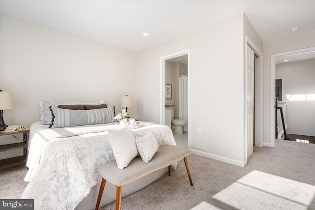 1413 E Lafayette Ave, Baltimore, MD 21213 - bedroom with carpet flooring, ensuite bathroom, recessed lighting, and baseboards
