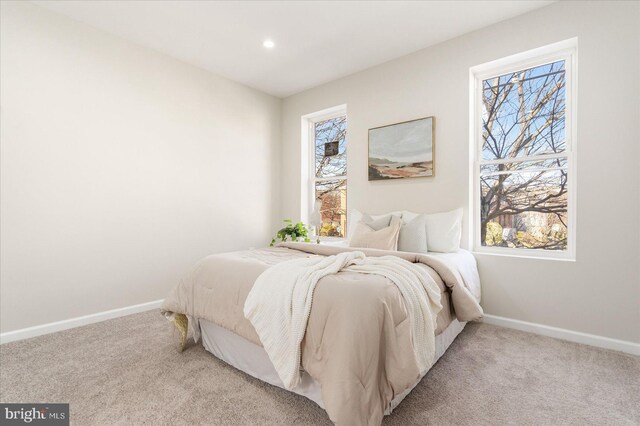1413 E Lafayette Ave, Baltimore, MD 21213 - bedroom with light carpet, baseboards, and recessed lighting