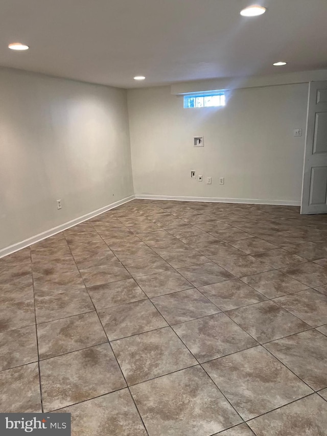 437 52nd St, Baltimore, MD 21224 - spare room with recessed lighting, tile patterned floors, and baseboards