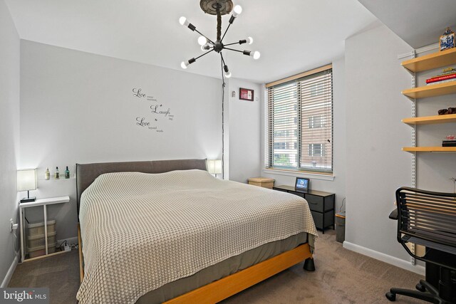 851 N Glebe Rd Unit 406, Arlington, VA 22203 - carpeted bedroom featuring a chandelier and baseboards