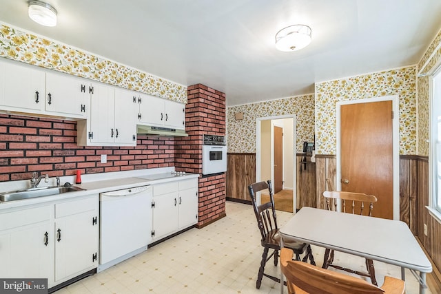 800 Little Shiloh Rd, West Chester, PA 19382 - kitchen with white appliances, wainscoting, light floors, wallpapered walls, and a sink