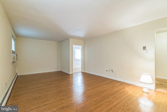 800 Little Shiloh Rd, West Chester, PA 19382 - unfurnished room with a baseboard radiator, wood finished floors, and baseboards