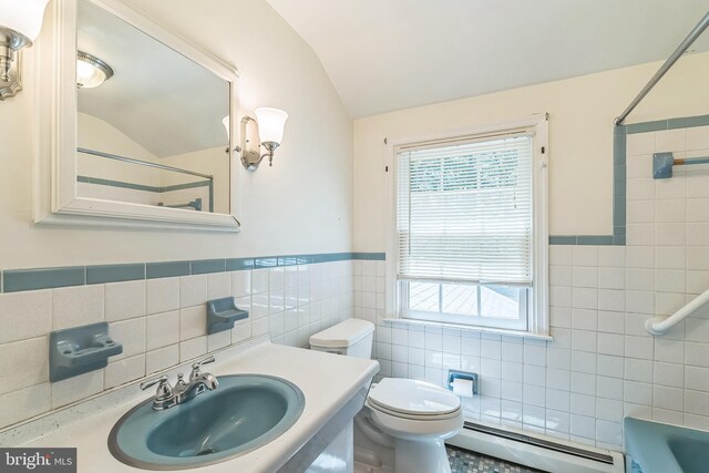 800 Little Shiloh Rd, West Chester, PA 19382 - bathroom featuring baseboard heating, a sink, tile walls, vaulted ceiling, and healthy amount of natural light