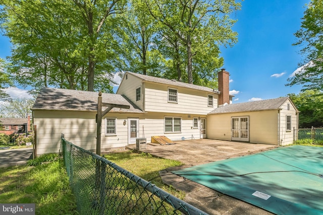 800 Little Shiloh Rd, West Chester, PA 19382 - rear view of house with a patio area, a fenced backyard, and a chimney