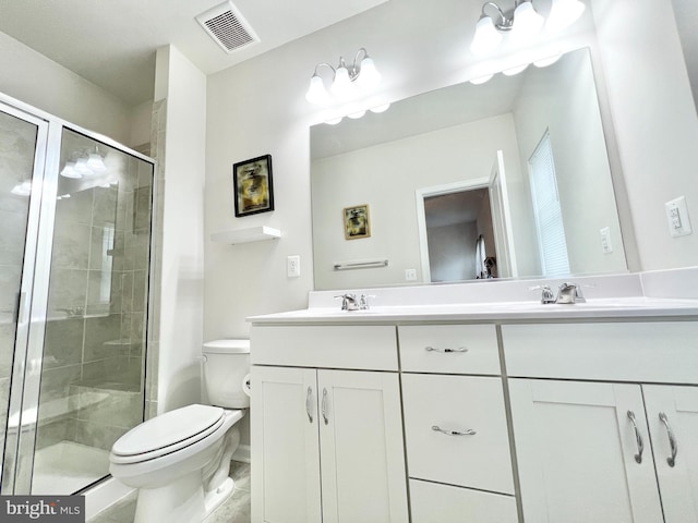 full bathroom with toilet, a stall shower, and double vanity