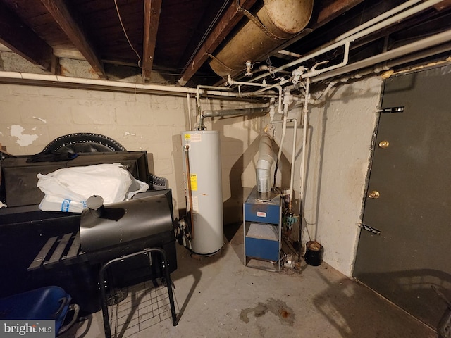 1351 Cambria St, Baltimore, MD 21225 - utility room featuring water heater and a heating unit