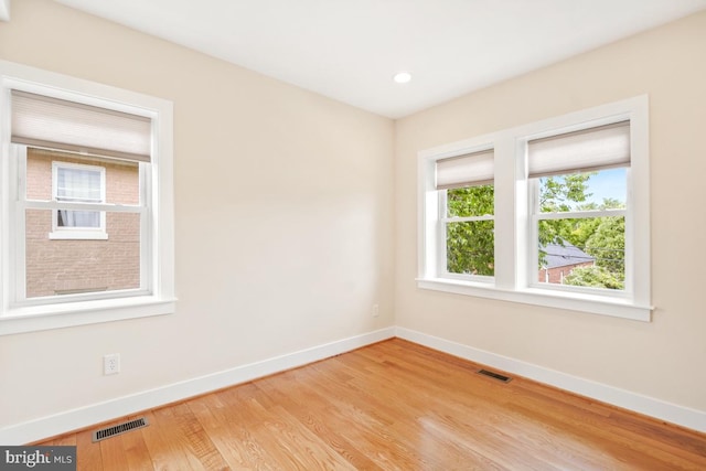 1706 Otis St NE, Washington, DC 20018 - empty room featuring baseboards, light wood-style floors, and recessed lighting