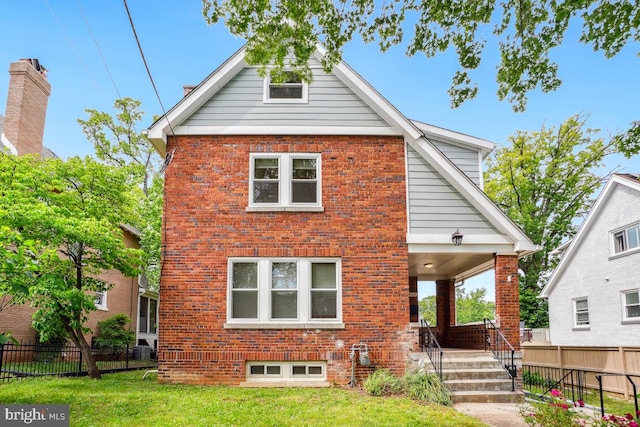 1706 Otis St NE, Washington, DC 20018 - view of front facade featuring brick siding and a porch
