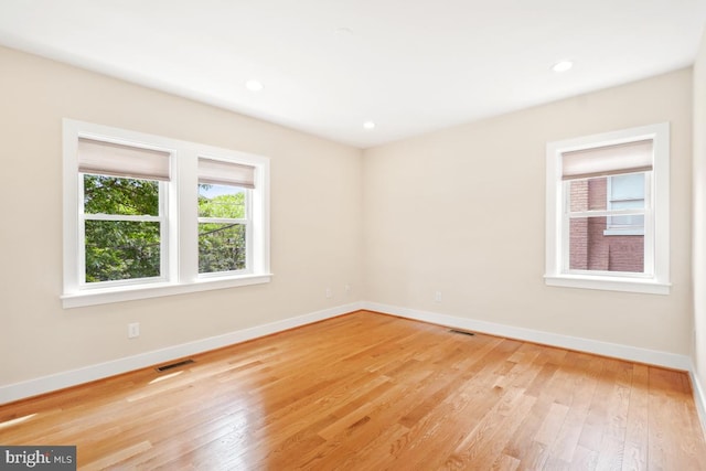 1706 Otis St NE, Washington, DC 20018 - spare room featuring light wood finished floors, baseboards, and recessed lighting