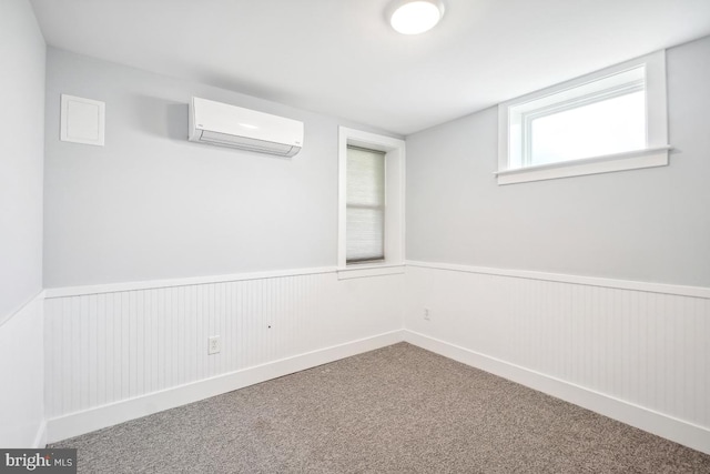 1706 Otis St NE, Washington, DC 20018 - below grade area with a wall unit AC, wainscoting, and carpet floors