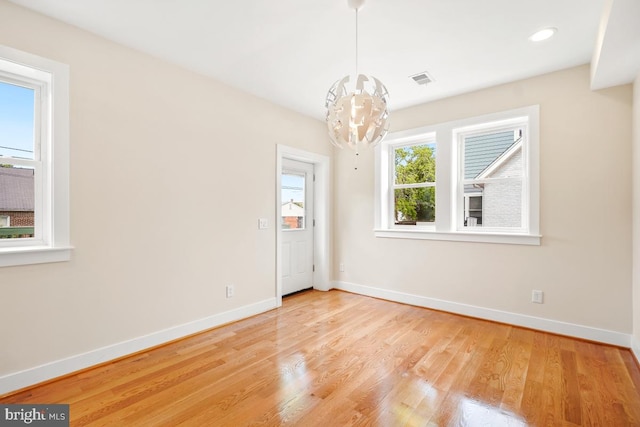 1706 Otis St NE, Washington, DC 20018 - spare room featuring baseboards, a chandelier, wood finished floors, and recessed lighting