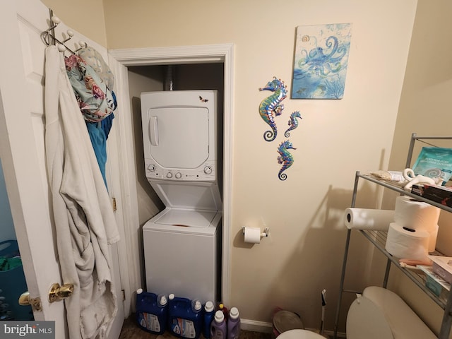 321 E 21st St, Baltimore, MD 21218 - washroom with stacked washer / dryer