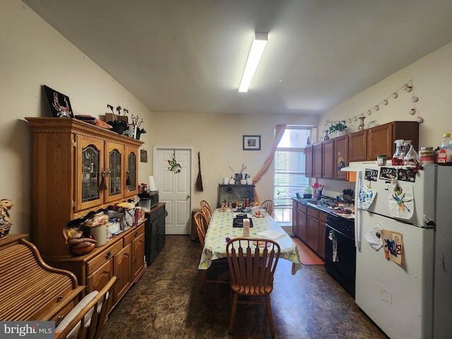 321 E 21st St, Baltimore, MD 21218 - kitchen featuring freestanding refrigerator, stove, and glass insert cabinets