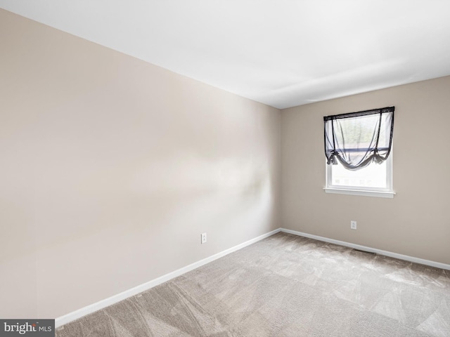 9 Patrick Henry Ct, Newark, DE 19711 - carpeted spare room with baseboards