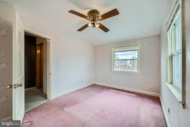unfurnished bedroom featuring carpet flooring and ceiling fan