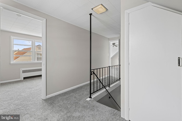 3142 Yorkway, Baltimore, MD 21222 - corridor featuring radiator heating unit, an upstairs landing, and carpet
