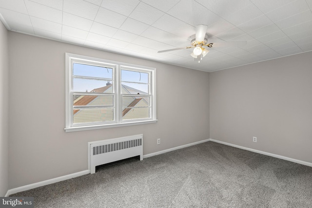 3142 Yorkway, Baltimore, MD 21222 - empty room featuring radiator heating unit, carpet flooring, and a ceiling fan