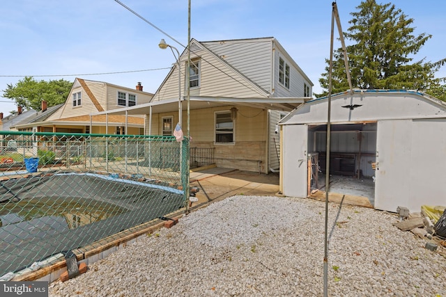 3142 Yorkway, Baltimore, MD 21222 - rear view of property featuring a storage shed
