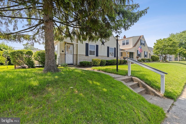 3142 Yorkway, Baltimore, MD 21222 - view of property hidden behind natural elements with stone siding and a front lawn