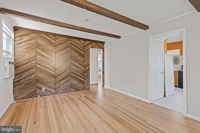 3142 Yorkway, Baltimore, MD 21222 - unfurnished living room with light wood finished floors and beamed ceiling