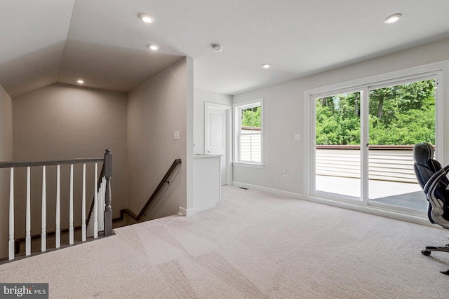 carpeted office space with recessed lighting, baseboards, and vaulted ceiling